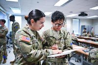 Two Future Soldier Preparatory Course students compare notes during a study hall session at Fort Jackson