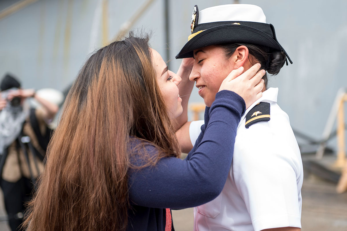 Ensign Vanessa Prado receives the first kiss