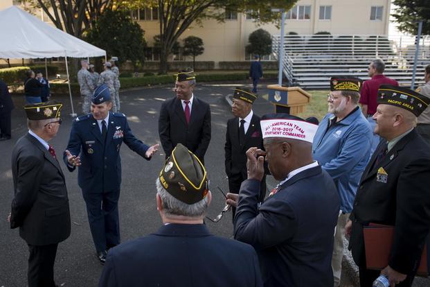 Col. Sergio Vega speaks with members of the Veterans of Foreign Wars Post 9555 during a Veterans Day Ceremony, Nov. 10, 2017, at Yokota Air Base, Japan. (U.S. Air Force/Senior Airman Donald Hudson)