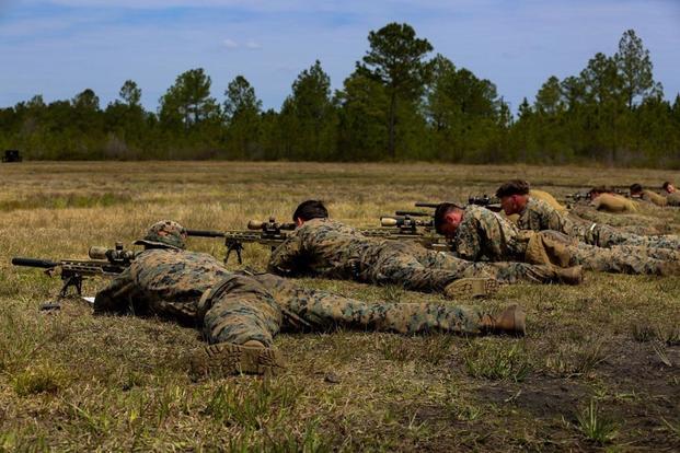 Marines aim and fire M40A6 rifles during an urban sniper course at Camp Lejeune, N.C., March 30, 2017. (U.S. Marine Corps photo by Lance Cpl. Jon Sosner)