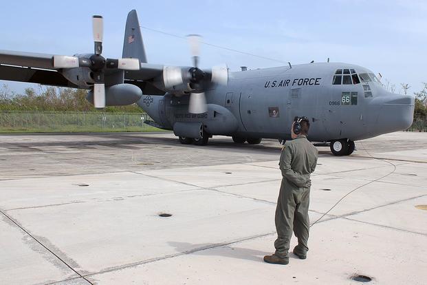 Airman 1st Class Edwin Ocasio observes engine start-up prior to a C-130 Hercules mission at Muniz Air National Guard Base, Puerto Rico, Oct. 18, 2017. (U.S. Air National Guard/Tech. Sgt. Dan Heaton)