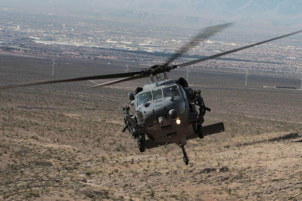 An HH-60G Pave Hawk helicopter, assigned to the 66th Rescue Squadron, flies during training on Nellis Air Force Base, Nevada, Feb. 22, 2018. (U.S. Air Force phoo/Kevin Tanenbaum)