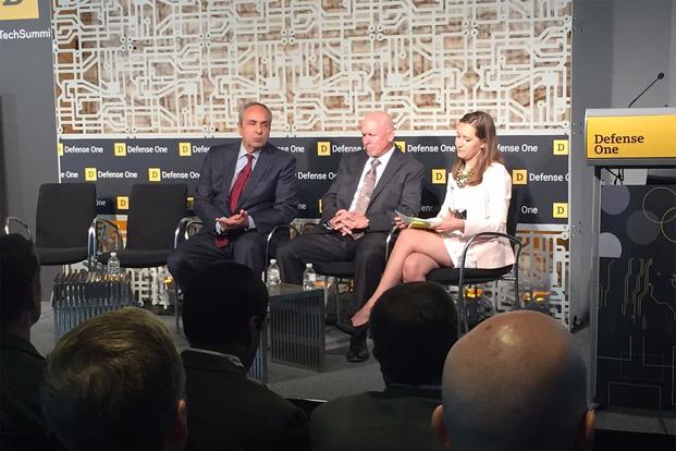 Richard J. Joseph, left, the Air Force’s chief scientist, and Mark Tapper, center, a special advisor on intelligence, surveillance and reconnaissance at the service, speak to Military.com’s Oriana Pawlyk at the Defense One Tech Summit in Washington, June 26, 2018. (DoD photo by Jim Garamone)