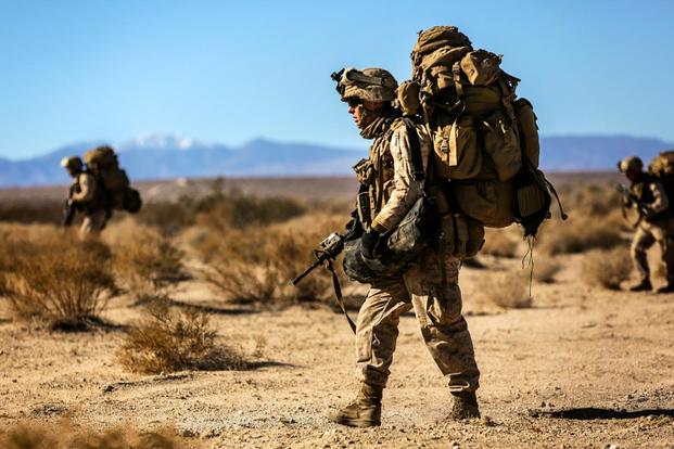 Members of 1st Battalion, 5th Marines patrol towards their objective during a training exercise in California.  (U.S. Marine Corps/Cpl. Justin A. Bopp)
