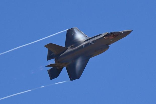 An F-35A Lightning II from the 388th Fighter Wing flies over the Warriors Over the Wasatch Air and Space Show June 24, 2018, at Hill Air Force Base, Utah. The F-35 was part of a four-ship participating in an attack demonstration. (U.S. Air Force photo/Todd Cromar)