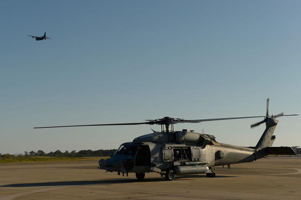 A U.S. Navy HH-60H Seahawk helicopter assigned to Helicopter Sea Combat Squadron (HSC) 84 taxis across the flight line at Hurlburt Field, Fla., May 6, 2014, during exercise Emerald Warrior 2014. (U.S. Air Force photo/Tim Chacon)