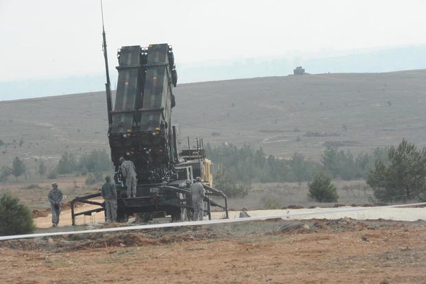 U.S. soldiers with the 3rd Battalion, 2nd Air Defense Artillery Regiment perform maintenance on Patriot missile launchers Feb. 5, 2013, in Gaziantep, Turkey. (U.S. Army/Capt. Royal Reff)