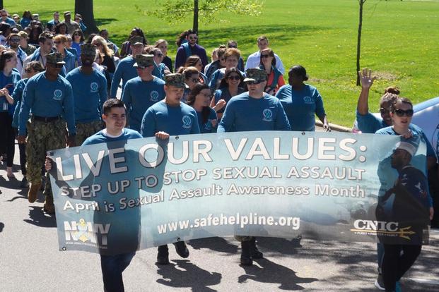 Supporters of Sexual Assault Awareness and Prevention Month from NSA Philadelphia and its tenant commands create a "sea of teal" on their awareness walk across April 23, 2019 in Philadelphia. (Defense Logistics Agency/John Dwyer)	