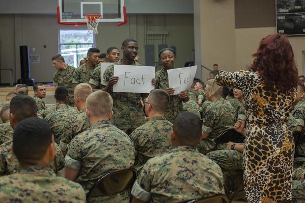 U.S. Marines assigned to the Marines Awaiting Training Platoon, Marine Corps Combat Service Support Schools, participate in a Sexually Transmitted Diseases brief at the Safety and Education Fair at Camp Johnson, N.C., April 26, 2019. (U.S. Marine Corps/Lance Cpl. Stephanie E. Soto)