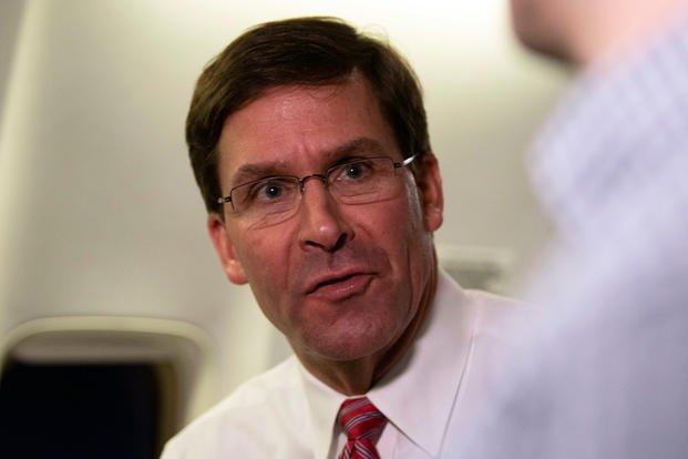 Defense Secretary Mark T. Esper speaks to reporters aboard a government aircraft, after concluding a trip to Belgium and Luxembourg for the 75th anniversary of the Battle of the Bulge, Dec. 16, 2019. (DoD photo/Lisa Ferdinando)