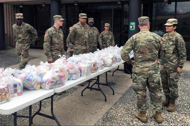New York Army National Guard soldiers distribute food in Westchester County, N.Y. on March 12, 2020. 
