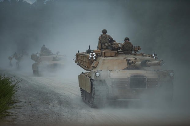 Marines track through tank trails on Camp Lejeune