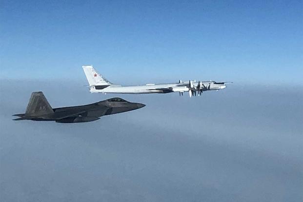 F-22 intercepts two Russian Tu-95 bombers.