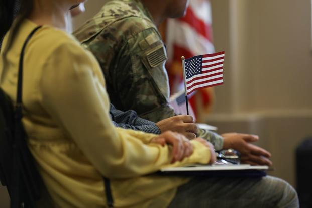 A naturalization ceremony at the Army Community Services office on Fort Carson, Colorado.