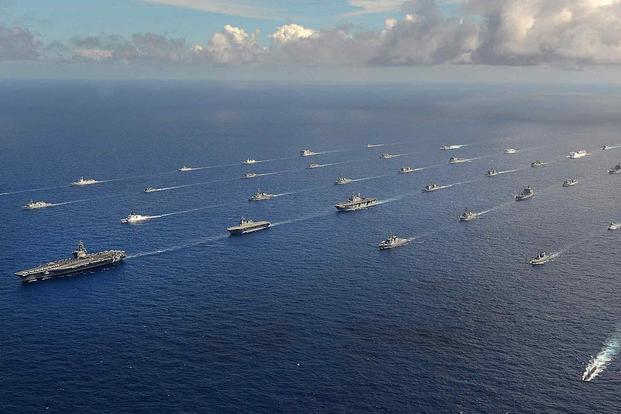 Forty-two ships and submarines in formation during RIMPAC Exercise 2014.