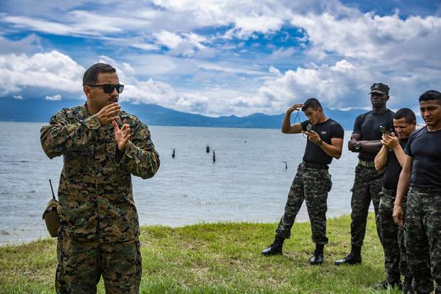 U.S. Marine briefs Honduran Marines.