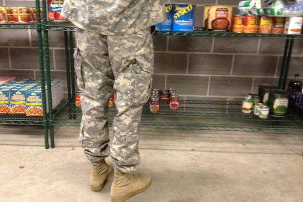 A soldier shops at a food pantry at the Kansas City, Missouri, armory.