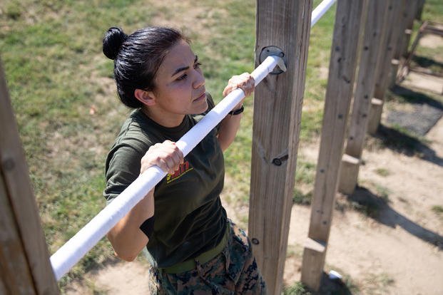 A Marine performs a pull-up in the sixth challenge of the High Intensity Tactical Training Championship at Butler Stadium aboard Marine Corps Base Quantico, Virginia.