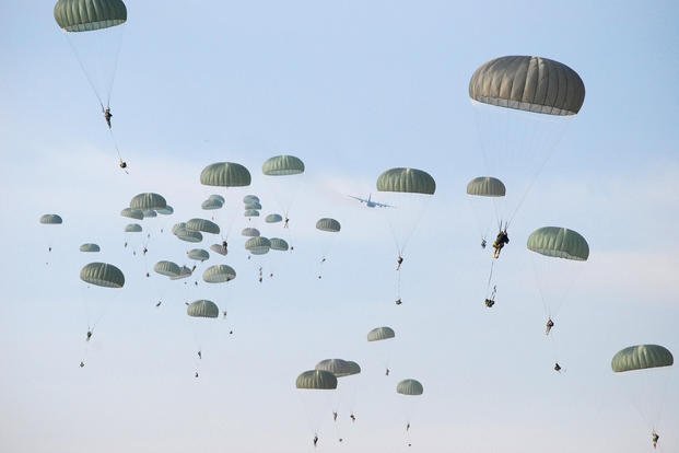 Fort Bragg paratroopers conduct an Airborne Operation over Sicily Drop Zone on a sunny North Carolina morning.