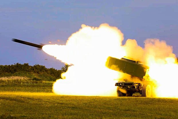Two reduced-range practice rockets (RRPR), fired from an M142 High Mobility Artillery Rocket System (HIMARS) attached to Baker Battery, 3rd Battalion, 321st Field Artillery Regiment, 18th Fires Brigade, fly over the Baltic Sea during a Latvian-led combined military exercise in Liepāja, Latvia.