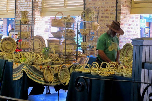 Sweetgrass baskets woven by the descendants of slaves along the nation's Southeast coast are offered for sale at the City Market in Charleston, S.C.