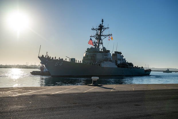 The Arleigh Burke-class guided-missile destroyer USS Carney departs Naval Station Rota, Spain.
