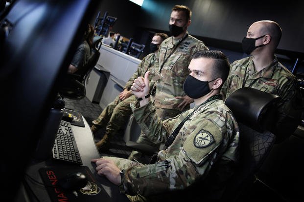 U.S. Cyber Command personnel work to defend the nation in cyberspace at Fort George G. Meade, Md.