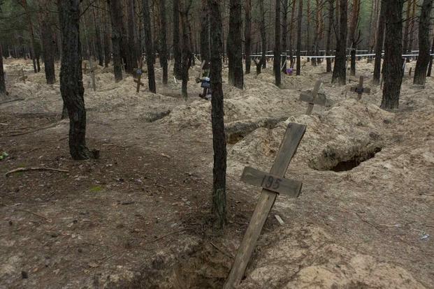 Mass grave cin Izium, Ukraine.