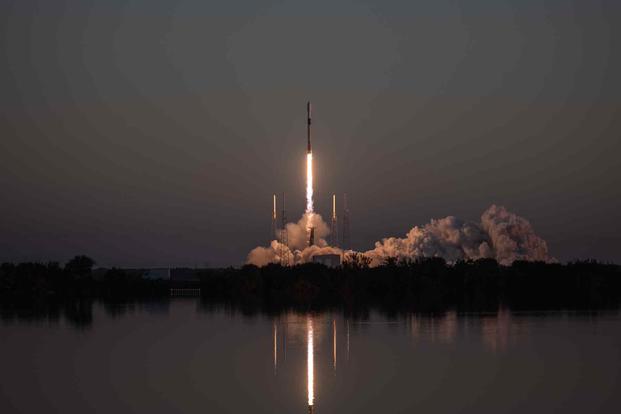 SpaceX Falcon 9 rocket launches from Cape Canaveral.