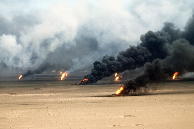 Oil well fires rage outside Kuwait City in the aftermath of Operation Desert Storm.