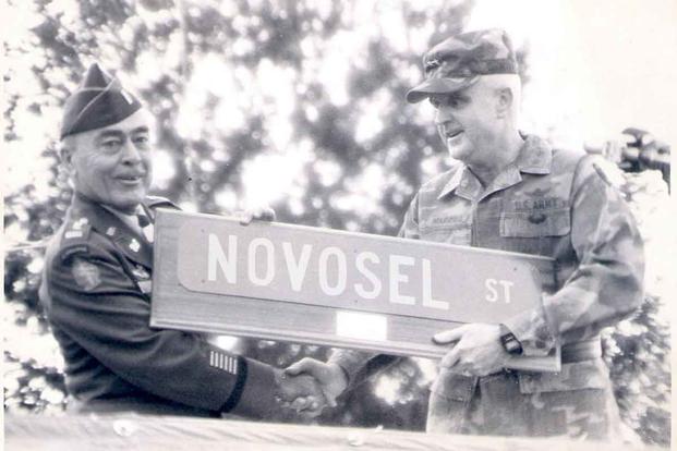 Mike Novosel receives a street sign named after him.
