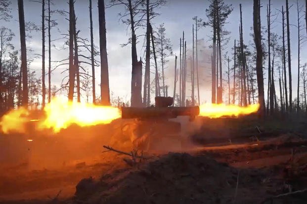 Russian army soldier fires a Fagot anti-tank missile system toward Ukrainian position