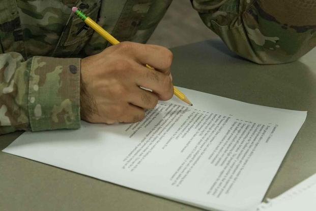 Soldier studies for Armed Services Vocational Aptitude Battery, or ASVAB, test