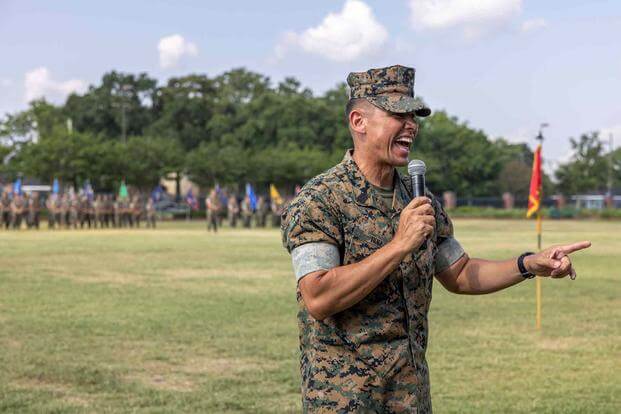 U.S. Marine Corps Sgt. Maj. Carlos A. Ruiz addresses an audience