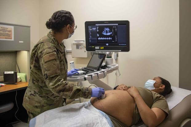 Obstetrician conducts an ultrasound