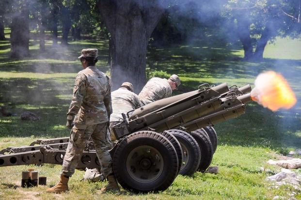 Soldiers from the Fort Leavenworth Salute Battery practice in advance of the post's Fourth Of July celebration.