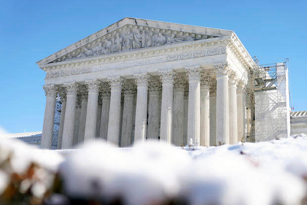 The U.S. Supreme Court is photographed through snow