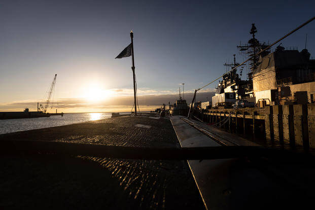 The sun sets on the USS Pasadena (SSN 752) at Naval Station Norfolk