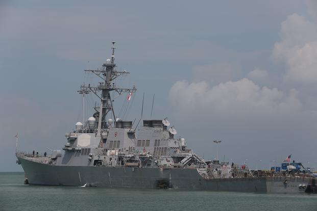 USS John S. McCain (DDG 56) moored pier side at Changi Naval Base in Singapore following a collision with the merchant vessel Alnic MC east of the Straits of Malacca and Singapore on Aug. 21, 2017. (U.S. Navy photo/Grady T. Fontana)