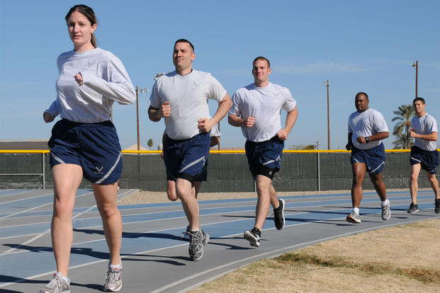 944th Fighter Wing members run laps at the base track. 