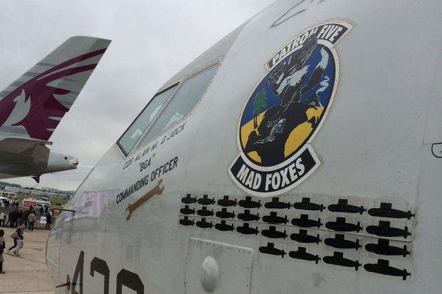 The P-8 Poseidon on display here at the Paris Air Show has 28 submarine decals on its side to show how many foreign submarines Patrol Squadron 5 has found and identified. (Military.com/Michael Hoffman)