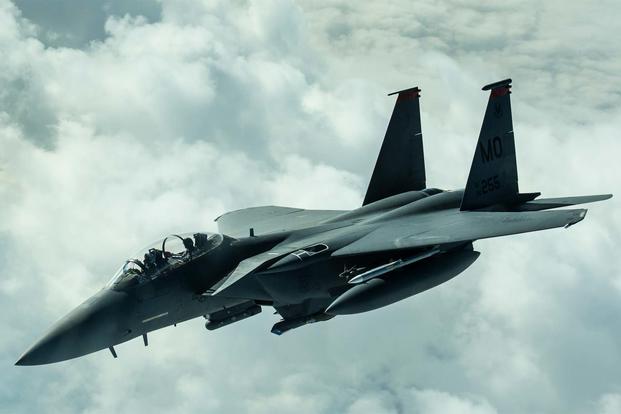 An F-15E Strike Eagle disconnects from a KC-10 Extender after receiving fuel over Iraq, Dec. 25, 2016. (U.S. Air Force photo/Senior Airman Tyler Woodward)