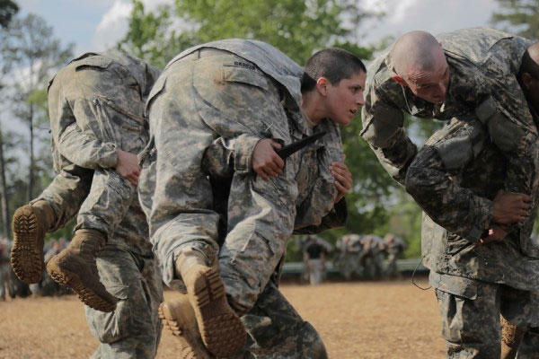 Capt. Kristen Griest, a military police officer from Connecticut, participates in close arm combatives during the Ranger Course on April 20 at Fort Benning, Georgia. She was one of the first two women to complete Ranger School. (US Army photo)