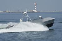 A common unmanned surface vehicle patrols for intruders during Trident Warrior 2011 on July 20, 2011. The experimental boat can operate autonomously or by remote. (U.S. Navy photo by Mass Communication Specialist Seaman Scott Youngblood)