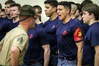 A Marine Corps drill instructor shouts commands to an enlistee during Drill Instructor Family Night in West Des Moines, Iowa on March 23. The Corps plans to grow by 1,100 Marines in fiscal 2019. (US Marine Corps photo/Levi Schultz)