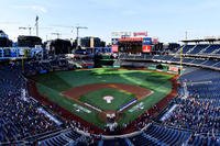 Air Force and Army coed softball teams render military honors during the All-Star Armed Services Classic Championship game, Washington, D.C., July 13, 2018. (U.S. Air Force photo/Rusty Frank)