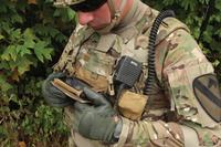Soldier checks out his smartphone. (Photo Credit: PEO Soldier)