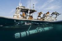 Norway’s defense officials worry about the rising use of drones as melting Arctic ice opens up sea lanes. Here, sailors assigned to Commander, Task Group 56.1, launch an MK 18 MOD 2 unmanned underwater vehicle from a rigid-hull inflatable boat during Squadex 2016 in the Arabian Gulf on Aug. 2, 2016. (U.S. Navy Combat Camera photo by Mass Communication Specialist 1st Class Blake Midnight)