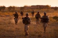Marines from India Company, 3rd Battalion, 3rd Marine Regiment, make their way through Trek Nawa, Afghanistan, back to Patrol Base Poole after completing Operation Mako, Sept. 21, 2010. (U.S. Marine Corps/Sgt. Mark Fayloga)