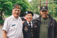 Three veterans smiling